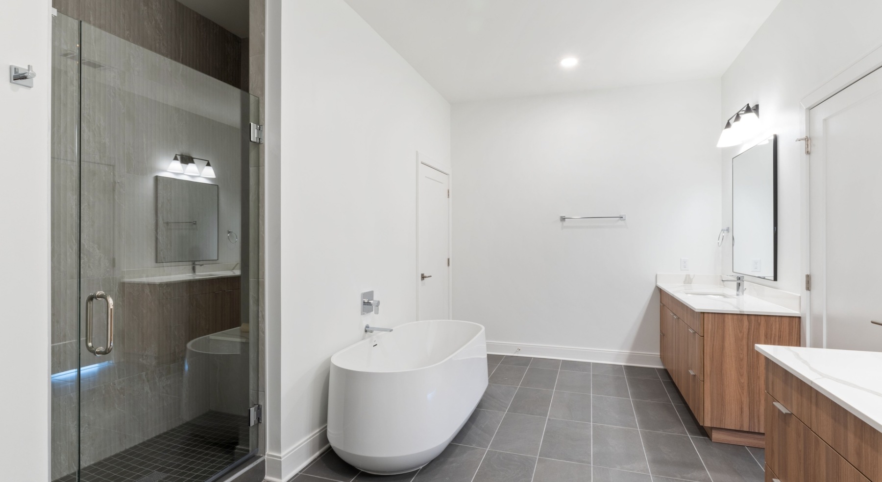 bath area with a standalone tub