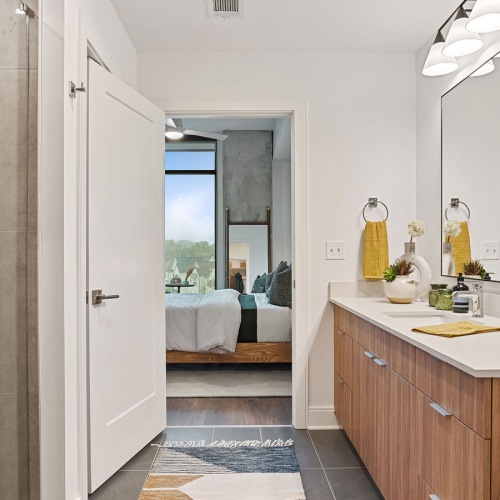 sink counter in bathroom with ample lighting