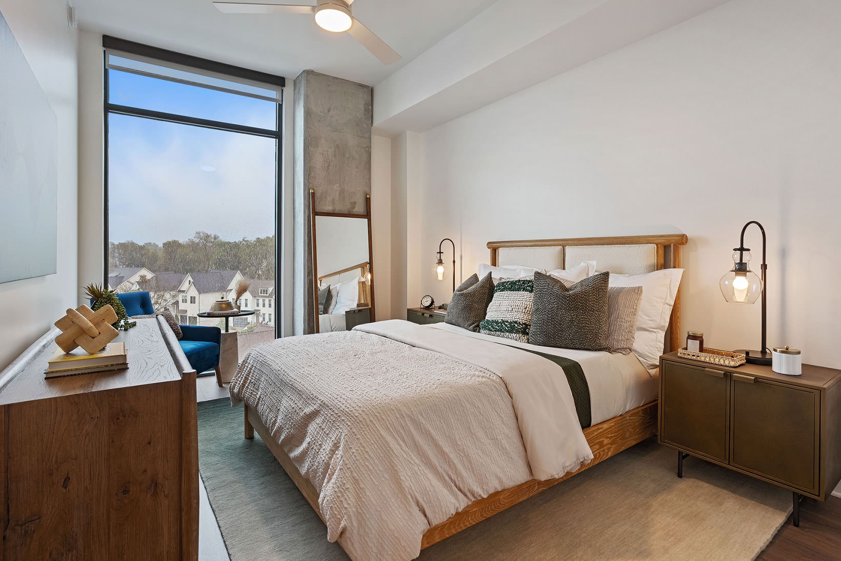 Relax and recharge in beautiful and spacious bedrooms bedroom with floor-to-ceiling window