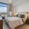 bedroom with floor-to-ceiling window
