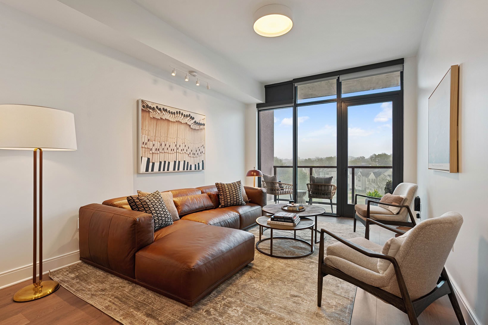 Generous living spaces with beautiful natural lighting spacious living room with access to private balcony
